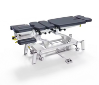 Table d'opération de physiothérapie électrique professionnelle pour lit chiropratique de soins sportifs