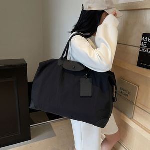 Sacs de voyage unisexes personnalisés avec logo de marque, sacs de rangement pour bagages de couleur unie simple, sacs fourre-tout de grande capacité pour voyager - Product Image 4