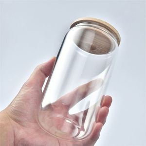 En stock dans nos entrepôts aux États-Unis : Verre en forme de canette de bière vierge pour sublimation, 12 et 16 oz, avec couvercle en bambou et paille - Product Image 1