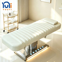 Table de massage électrique à 3 moteurs avec lumière LED et base en acier inoxydable réglable pour salon de beauté