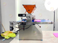 Machine de remplissage semi-automatique de pâte à gâteau et de bonbons gélifiés pour table, idéale pour les boulangeries et ateliers.