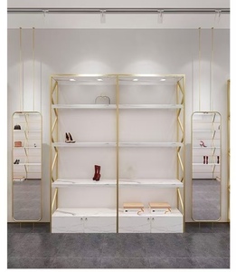 Estante de Exhibición de Zapatos de Lujo en Dorado con Iluminación LED para Tiendas y Salones - Product Image 1
