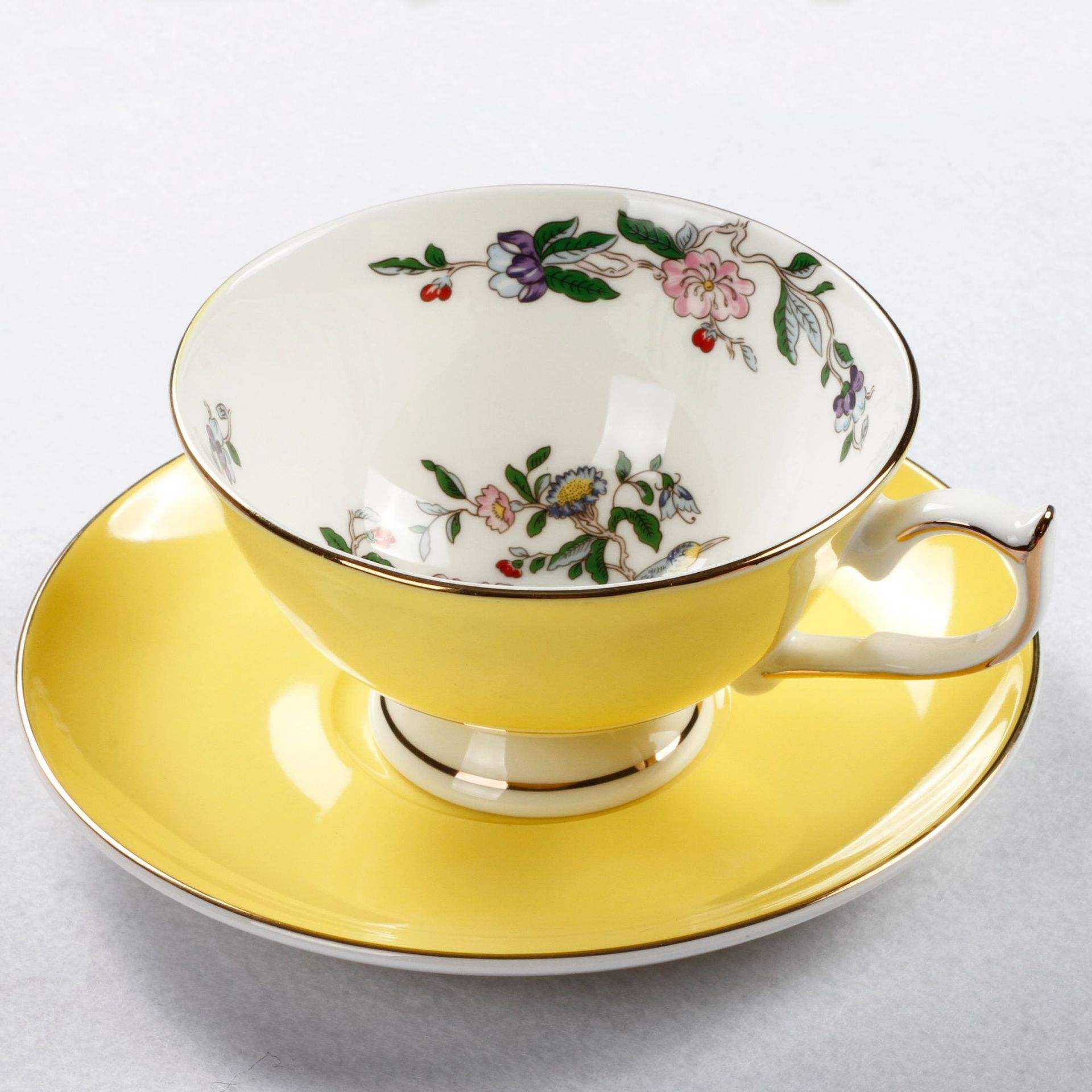 Yellow Cup and Saucer
