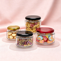Pot en verre rond transparent personnalisé de 100 ml, 180 ml, 220 ml, 280 ml, 500 ml avec couvercle en métal pour le stockage des aliments, des bonbons, des épices et l'emballage cosmétique
