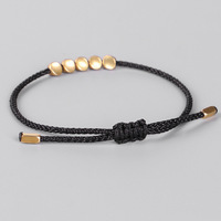 Pulsera budista tibetana trenzada hecha a mano creativa de nuevo diseño, pulsera de cuerda de la suerte con cuentas de cobre irregulares para hombres y mujeres, joyería