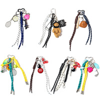 Porte-clés vintage multi-styles avec cordon tressé, breloques ours en peluche, tennis, baseball, dés et fermoir cœur, également utilisable comme breloque de sac