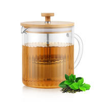 Théière en verre borosilicate transparent avec couvercle en bambou naturel et filtre amovible pour la préparation du thé, compatible avec le cuisinière et le micro-ondes