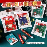 Ensemble de papeterie de Noël, sac transparent refermable, stylo à bille, carnet, breloque de lanière, 4 thèmes, cadeau pour enfants, prix, mini pochette