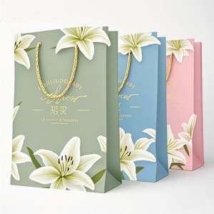 ราคาโรงงาน ถุงกระดาษของขวัญช้อปปิ้งสุดหรูคุณภาพสูงแบบกำหนดเองสำหรับธุรกิจ พร้อมการพิมพ์สีที่โดดเด่น - Product Image 5
