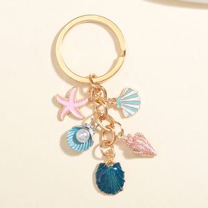 かわいいキーホルダー カラフルなヒトデ 貝殻 シェルキーリング ビーチキーチェーン 海の土産 女性 女の子向け DIY ハンドメイドジュエリー - Product Image 3