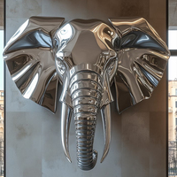 Statue de tête d'éléphant personnalisée en acier inoxydable avec relief en métal poli avec un style Feng Shui pour installation artistique