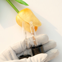 Pipette graduée à embout personnalisé en verre transparent avec caoutchouc noir pour huile essentielle