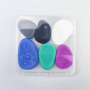 Pierres sensorielles en silicone colorées pour enfants, jouets texturés anti-stress dans un étui de rangement pour l'entraînement tactile, la relaxation en voyage et les cadeaux - Product Image 1