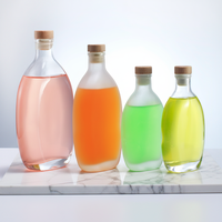 Bouteille d'eau en verre de forme spéciale 250ml 500ml 750ml avec bouchon personnalisable, impression sablée, logo, conteneur vide pour jus et boissons