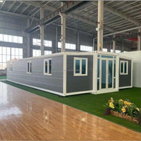 Maison extensible à double aile de 30 pieds, logement portable pour chantier de construction