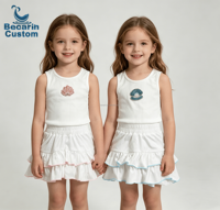 Ensemble d'été pour enfants style jeune fille européenne et américaine, personnalisé OEM, débardeur sans manches à patch coquillage + jupe à volants, direct usine