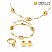 Parure de bijoux dorée en acier inoxydable anti-ternissement, 4 pièces : bracelet, collier, boucles d'oreilles, bague – Cadeau pour femmes et jeunes filles pour les fêtes