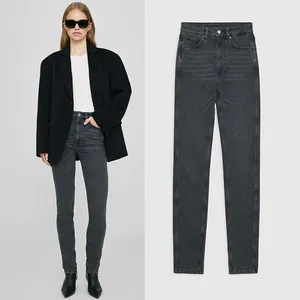 Nouveau bouton élastique taille haute noir gris lavage Denim femmes coupe ajustée petits pieds Jeans pantalon