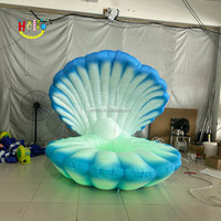 Coquille gonflable de scène de décoration de coquillage gonflable géante personnalisée avec lumière LED pour la fête de mariage