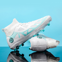 Chaussures de futsal personnalisées en gros avec logo TF, tige antidérapante en TPU et crampons en mesh, modèle 2509C, semelle intermédiaire en TPU pour entraînement professionnel, unisexe