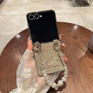 Housses de téléphone à rabat scintillantes de luxe avec décorations Guangzhou vente en gros de housses mobiles à rabat pour <span class=keywords><strong>Samsung</strong></span> Galaxy avec bracelet en perles - Product Image 3