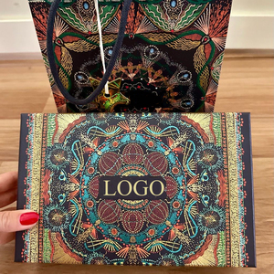 Luxury Clothes Gift Packaging Paper Bags With <b>Ribbon</b> Handle Paper Shopping Bags With Your Own logo - Product Image 1