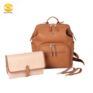 eco-friendly vegan leather diaper bag multifunction baby bag for mom and dad factory supply changing bags included changing mat