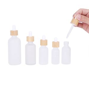 บรรจุภัณฑ์เครื่องสำอางแก้วฝ้าแบบหรูหราขนาด 30 มล. 50 มล. พร้อมฝาไม้ไผ่สำหรับครีม ขายส่ง - Product Image 3