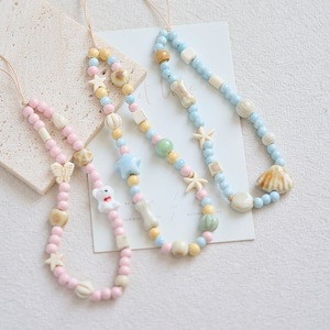 GT Blue Sea Legend Étoile à cinq branches Lanyard Shell Petite <span class=keywords><strong>chaîne</strong></span> de <span class=keywords><strong>téléphone</strong></span> à poignet court en céramique perlée - Product Image 1