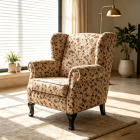 Fauteuil d'appoint vintage en tissu floral avec dossier haut et pieds en bois massif pour salon