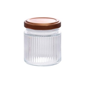 Vente en gros Bouteille en verre pour pouding nid d'oiseau Bocal en verre pour le stockage des aliments à rayures verticales avec bouchon en métal - Product Image 4