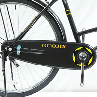 Vélo de ville élégant et classique à cadre en acier avec porte-bagages arrière, design à cadre bas, monovitesse, confortable pour les trajets urbains des adultes