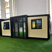 Casa Contenedor Modular Prefabricada de Doble Ala con Estructura de Acero y Paneles Corrugados Personalizados, Expandible con Múltiples Ventanas