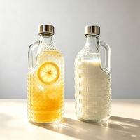 Carafe en verre de 1 litre grande capacité pour infusion à froid, avec poignée au design texturé, style moderne et minimaliste, pour thé et jus