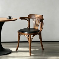 Chaise de salle à manger nordique moderne en bois massif avec dossier et accoudoirs rembourrés à design mobile pour salons de thé, cafés et bars