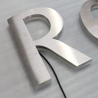 Letrero LED YIJIAO Personalizado con Letras de Canal Metálicas Retroiluminadas, Acero Inoxidable Cepillado, Letrero con Halo Luminoso para Tienda