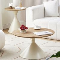 Table basse ronde moderne avec dessus grain de bois et base en métal