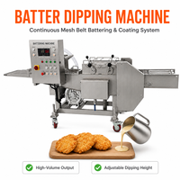 Machine à paner industrielle pour la production de nuggets de poulet frit sur une ligne de production dans une usine de transformation alimentaire