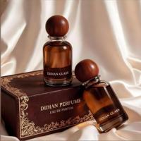 Emballage de luxe personnalisé pour flacons de parfum vides en ambre de 30 ml, 50 ml, 100 ml, cylindriques, portables, avec atomiseur et bouchon.