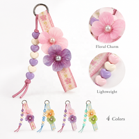 Porte-clés trèfle à quatre feuilles artificiel mignon avec pompon, breloque florale bohème pour sac, cadeau pour femmes et filles, accessoire