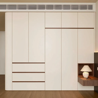 Armoire de rangement grande capacité pour chambre à coucher, à montage facile, finition haute brillance avec éclairage LED et poignée intégrée
