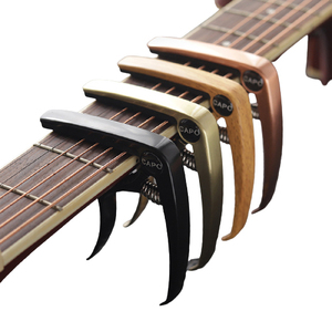 Capo de guitarra acústica de color metálico Instrumentos de cuerda Piezas y accesorios - Product Image 1