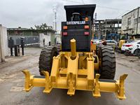 Machine de nivellement de terre d'occasion CAT 140H 140K