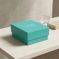 Boîte cadeau en papier rigide mat bleu turquoise de qualité supérieure avec logo personnalisé en feuille d'or gaufrée pour emballage de marque de luxe