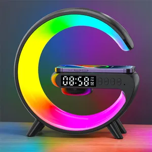 Venta superior Cargador inalámbrico inteligente Forma de G Sunrise Wakeup Lámpara de noche Atmósfera LED RGB Altavoz de luz nocturna