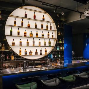 رف نبيذ أنيق وفاخر من الفولاذ المقاوم للصدأ بتصميم دائري جديد، خزانة بار متكاملة للاستخدام المنزلي أو في النوادي - Product Image 1