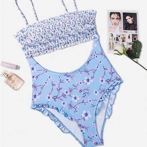 ชุดชายหาดฤดูร้อนปี 2025 สำหรับผู้หญิง ชุดเดรสแห้งเร็ว ลายจุดสีพื้นใหม่ โบว์ผูกหลัง เสื้อกล้ามเปิดหลัง กระโปรงสั้นเอวต่ำ 1 ชิ้น - Product Image 1