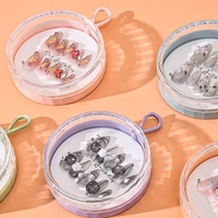 Boîtes cadeaux rondes suspendues en plastique, surface lisse, pour faux ongles, avec couvercle transparent, vente en gros