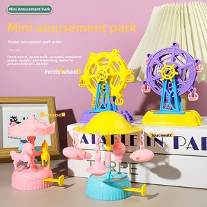 Carrusel de plástico de mano del tamaño de la <span class=keywords><strong>palma</strong></span> de la mano, operado con monedas, tipo noria, juguete infantil para puestos callejeros - Product Image 1
