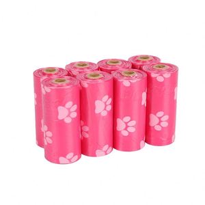 Sacs à déjections canines biodégradables à 100 %, 15 sachets par rouleau, imprimés pattes roses, très demandés - Product Image 1